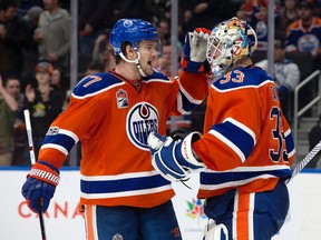 Edmonton Oilers goalie Cam Talbot is congratulated by Oscar Klefbom following their 2-0 win over the Vancouver Canucks at Rogers Place in Edmonton on Saturday, March 18, 2017. (David Bloom)