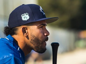 Toronto Blue Jays second baseman Devon Travis looks on during spring training in Dunedin on Feb. 19, 2017. (THE CANADIAN PRESS/Nathan Denette)