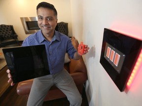 Salman Qureshi, CEO and President of Umbrela Smart Inc., displays some items related to his business, in Winnipeg. Saturday, March 18, 2017. Chris Procaylo/Winnipeg Sun/Postmedia Network