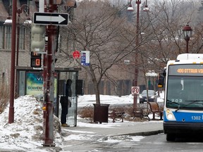 An STO bus follows its route in Gatineau in 2014.