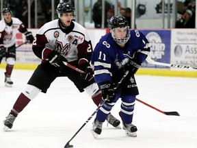 London Nationals' Adam Sinclair (11) is trailed by Chatham Maroons' Dakota Bohn (2) in the first period at Chatham Memorial Arena in Chatham, Ont., on Sunday, March 19, 2017. Sinclair scored the Nationals' fourth goal on the play. (MARK MALONE, Postmedia News)