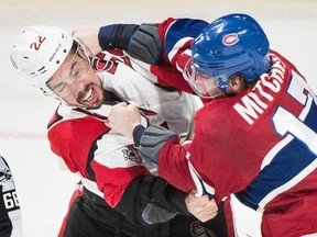 Montreal Canadiens' Torrey Mitchell, right, fights with Ottawa Senators' Chris Kelly during an NHL game on March 19, 2017. (THE CANADIAN PRESS/Graham Hughes)