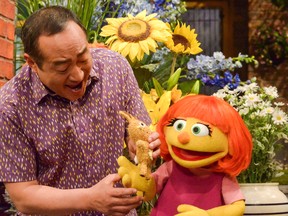 This image released by Sesame Workshop shows Julia, a new autistic muppet character debuting on the 47th Season of "Sesame Street," on April 10, 2017, on both PBS and HBO. (Zach Hyman/Sesame Workshop via AP)