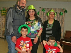 Celebrating their first St. Patrick’s Day in Canada, (back) Sharif Al Nassad and Abeer Allias, Abeer’s mother and the children George and Joseph. They are among the 40,000 Syrians resettled in Canada.(Submitted photo)