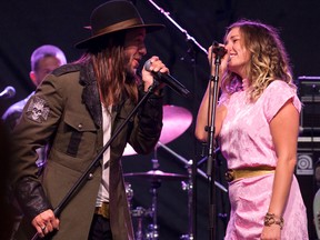 Clayton Bellamy of The Road Hammers and Kelly Prescott perform with The Dead Flowers on an outdoor stage during the Canadian Country Music Association's Country Music Week at Budweiser Gardens in London, Ont. on Saturday September 10, 2016. (Free Press file photo)