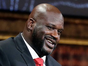 In this Sept. 9, 2016, file photo, basketball Hall of Fame inductee Shaquille O'Neal speaks during induction ceremonies in Springfield, Mass. O'Neal said on the March 20, 2017, edition of his podcast that he believes the world is flat. (AP Photo/Elise Amendola, File)
