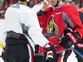 Senators forwards Derick Brassard (left) and Kyle Turris (right) chat during team practice at the Canadian Tire Centre in Ottawa on March 14, 2017. (Errol McGihon/Postmedia)