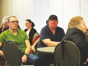 Drayton Valley residents listen to a presentation from CORVUS about an increase in utility rates at the MacKenzie Centre on March 13.