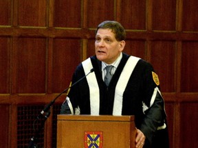 Queen's University Principal Daniel Woolf addresses the Queen's University senate meeting earlier this month. (Wade Morris/For The Whig-Standard)