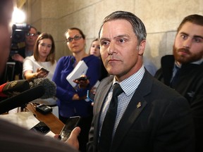 Finance Minister Cameron Friesen takes a question from media at the Manitoba Legislative Building in Winnipeg on Mon., March 20, 2017. Kevin King/Winnipeg Sun/Postmedia Network