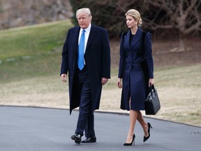 In this Feb. 1, 2017 file photo, President Donald Trump and his daughter Ivanka Trump walk to board Marine One on the South Lawn of the White House in Washington. Ivanka Trump is working out of a West Wing office and will get access to classified information, though she is not technically serving as a government employee, according to an attorney for the first daughter. (AP Photo/Evan Vucci, File)