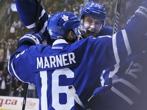 Toronto Maple Leafs center Mitchell Marner (16)and Toronto Maple Leafs left wing James van Riemsdyk (25)after scoring in the third period on Monday March 20, 2017. The Toronto Maple Leafs hosted the Boston Bruins at the Air Canada Centre in Toronto. Veronica Henri/Toronto Sun/Postmedia Network