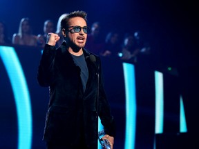 Actor Robert Downey Jr. accepts the Favorite Movie Actor award onstage during the People's Choice Awards 2017 at Microsoft Theater on January 18, 2017 in Los Angeles, California. (Photo by Christopher Polk/Getty Images for People's Choice Awards)