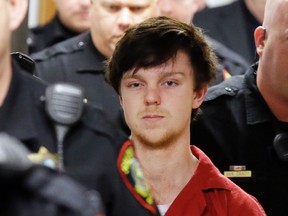 In this Feb. 19, 2016, file photo, Ethan Couch is led by sheriff deputies after a juvenile court hearing in Fort Worth, Texas. Lawyers for Couch, who used an "affluenza" defense in a 2013 fatal drunken-driving wreck, filed a motion Friday, March, 17, 2017, with the Texas Supreme Court in an effort to secure his release from jail. They argue that a judge had no authority to sentence Couch to nearly two years in jail after his case was moved from juvenile to adult court. (AP Photo/LM Otero, File)