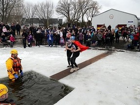 Intelligencer file photo
Last year’s YMCA polar plunge raised $7,400 for the Strong Kids Campaign. The event returns to Belleville April 1 and the YMCA is encouraging area residents to participate.
