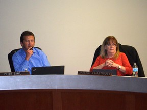 Chief administrative officer Peter Smyl (left) and Coun. Darlene Chartrand at the March 13 Whitecourt Town Council meeting (Jeremy Appel | Whitecourt Star).