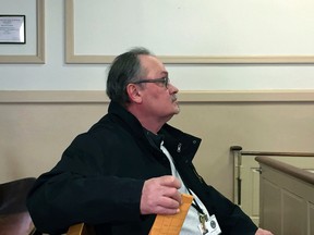 In this Monday, March 20, 2017 photo, Robert J. Guidi sits during a hearing where he pleaded guilty to theft by deception and violating New Jersey’s Stolen Valor Act at the Morris County Courthouse in Morristown, N.J. (Peggy Wright /The Daily Record via AP, Pool)