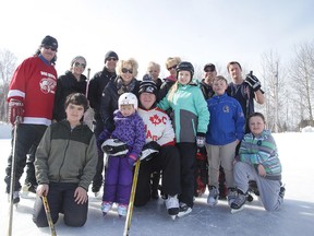 Skead resident  Dan McCourt with family and friends at the outdoor rink in Skead , Ont. on Monday February 20, 2017. McCourt enjoyed a 25-year career as an NHL linesman, and a decade of involvement with the NHL officials management team. Gino Donato/Sudbury Star/Postmedia Network