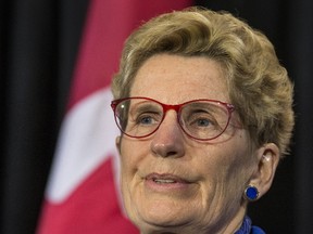 Of 240 greenhouse gas-emitting industries which fall under Premier Kathleen Wynne’s cap and trade scheme, 102 are getting free carbon credits from the government — free money, courtesy of taxpayers — for at least the first four years of the program. (CRAIG ROBERTSON/TORONTO SUN)