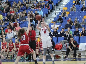 Jasper Place high school Rebels' Haily Weaver sets up and shoots in front of Vicotria Bishop from Calgary's Western Canada Redmen on the way to a 74-59 win in the 2016-17 4A provincial final. (Supplied)