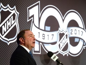 NHL commissioner Gary Bettman speaks at a news conference in Ottawa on March 17, 2017. On Tuesday, Bettman said "people should assume we are not going" to the Olympics next year in South Korea. (Adrian Wyld/The Canadian Press)