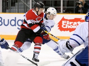 67's forward Artur Tyanulin battles for the puck and position in front of the Mississauga net during a Jan. 24 game at TD Place arena.