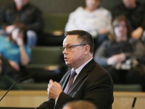 Trevor Bain, Chief of Fire and Paramedic Services at City of Greater Sudbury, presents the proposed fire and paramedic services optimization plan to city councillors and residents in Sudbury, Ont. on Tuesday March 21, 2017. Gino Donato/Sudbury Star/Postmedia Network