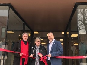 Sarnia Mayor Mike Bradley, Lilith Boutique owner Chris Yurchuk and Sarnia Coun. Brian White cut a red ribbon during Lilith Boutique's grand re-opening on March 3rd. 
handout/Sarnia This Week