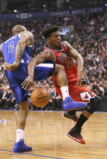 Toronto Raptors forward PJ Tucker (2) and Chicago Bulls forward Jimmy Butler (21) in Toronto, Ont. on Tuesday March 21, 2017.  The Toronto Raptors host the Chicago Bulls at the Air Canada Centre in Toronto.
