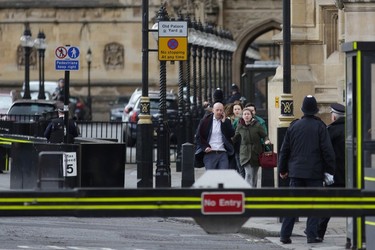 People leave after being evacuated from the Houses of Parliament in central London on March 22, 2017 during an emergency incident. Britain's Houses of Parliament were in lockdown on Wednesday after staff said they heard shots fired, triggering a security alert. / AFP PHOTO / DANIEL LEAL-OLIVASDANIEL LEAL-OLIVAS/AFP/Getty Images