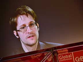 Whistleblower Edward Snowden is broadcast live from Russia at the Sakura Stage at the CeBIT 2017 Technology Trade Fair on March 21, 2017 in Hanover, Germany. The 2017 CeBIT will run from March 20-24. (Photo by Alexander Koerner/Getty Images)