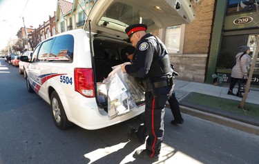 Toronto Police raid a Cannabis Culture location at Queen St. E and Broadview Ave. turning up bud, cash and other unidentified materials on Wednesday March 22, 2017. Jack Boland/Toronto Sun/Postmedia Network