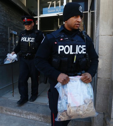 Toronto Police raid a Cannabis Culture location at Queen St. E and Broadview Ave. turning up bud, cash and other unidentified materials on Wednesday March 22, 2017. Jack Boland/Toronto Sun/Postmedia Network