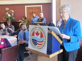 Kris Lee, Canadian chairperson of the Binational Public Advisory Council for the St. Clair River, speaks during a public meeting the International Joint Commission held Wednesday at the Lochiel Kiwanis Community Centre in Sarnia. It was one of several public meetings the commission is holding around the Great Lakes. (Paul Morden/Sarnia Observer)