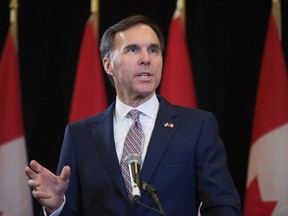 Minister of Finance Bill Morneau speaks during a press conference at the media lock-up, before tabling the budget in the House of Commons on Parliament Hill, in Ottawa on Wednesday, March 22, 2017. THE CANADIAN PRESS/Justin Tang