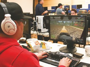 Bryant Munton, who's originally from Vulcan but now lives in Calgary, plays Farming Simulator 2017 on Friday, March 17 during VulcLan, held at the Cultural-Recreational Centre. Jasmine O’Halloran Vulcan Advocate