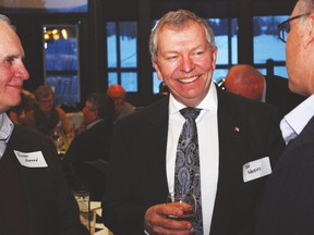 Ted Menzies, former Macleod MP, mingles with guests during a dinner held in his honour at the Highwood Golf and Country Club in High River on March 11. Paul Krajewski Postmedia Network