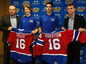 Edmonton Oil Kings Head Coach Steve Hamilton (left) and Edmonton Oil Kings General Manager Randy Hansch (right) welcome the team's two first round draft picks Liam Keeler and Matthew Robertson in Edmonton on May 16, 2016. The Oil Kings will select fourth in the 2017 Bantam Draft.