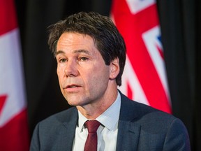 Health Minister Eric Hoskins confirmed that early conversations have taken place between the groups about getting back to bargaining with Ontario's doctors. (THE CANADIAN PRESS/PHOTO)