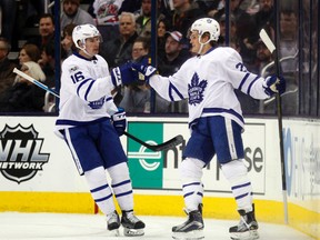Maple Leafs forward William Nylander (right) celebrates with forward Mitch Marner after Nylander's goal against the Blue Jackets during second period NHL action in Columbus, Ohio, on Wednesday, March 22, 2017. (Paul Vernon/AP Photo)