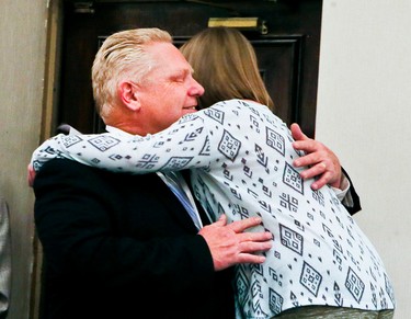Stephanie hugs Doug Ford as she leaves the stage after speaking about her father as the Ford family hosts a evening to celebrate Rob Ford's memory in Etobicoke on Wednesday March 22, 2017. Veronica Henri/Toronto Sun/Postmedia Network