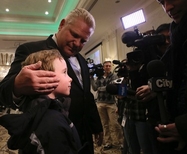 The Ford family hosts a evening to celebrate Rob Ford's memory in Etobicoke on Wednesday March 22, 2017. Rob Ford stands by Rob Ford's son Doug as he is interviewed at the event by the media.Veronica Henri/Toronto Sun/Postmedia Network