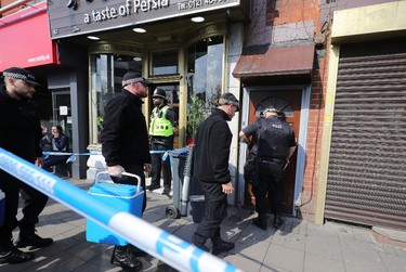 A police search team enters a flat above Shiraz Restaurant, in Hagley Road, Birmingham, which was raided by anti-terror police in connection with the London Terror attacks on March 23, 2017 in Birmingham, England. Four people have been killed and around 40 people injured following yesterday's attack by the Houses of Parliament in Westminster.  (Photo by Christopher Furlong/Getty Images)