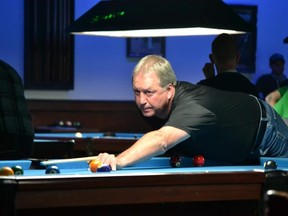 Mark Weaver takes a shot during a pool tournament last year in memory of his late son, Jamie. (Photo submitted)
