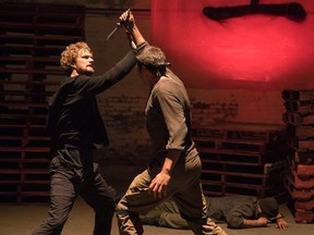 This image released by Netflix shows Finn Jones, left, in a scene from the Netflix original series, "Iron Fist." The series is and Netflix’s fourth Marvel project, after “Daredevil,” “Jessica Jones” and “Luke Cage." (Patrick Harbron/Netflix via AP)