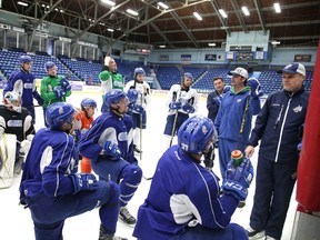 The Sudbury Wolves coaching staff goes through instructions with their players at practice ahead of Friday's playoff opener against the Generals in Oshawa. Gino Donato/The Sudbury Star