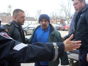Convicted killer Mohammad Shafia is escorted into Frontenac County Court House on Wednesday. (Ian MacAlpine/The Whig-Standard)