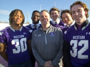 Western Mustangs head recruiter Chris Marcus says he has one of the best defensive-back recruiting classes this year, including Dante Brown, left, Tommy Ngongo, Chase Boycotte, Daniel Valente and Jacob Andrews. (MIKE HENSEN, The London Free Press)