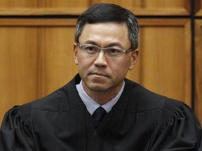 U.S. District Judge Derrick Watson in Honolulu. (George Lee/The Star-Advertiser via AP)