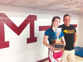 Wrestler Klara Patel with her former coach Takis Zervas (right), who guided her until the 2016-17 season, when she was named the top athlete of the National Capital Secondary School Athletic Association championships. (Martin Cleary photo)